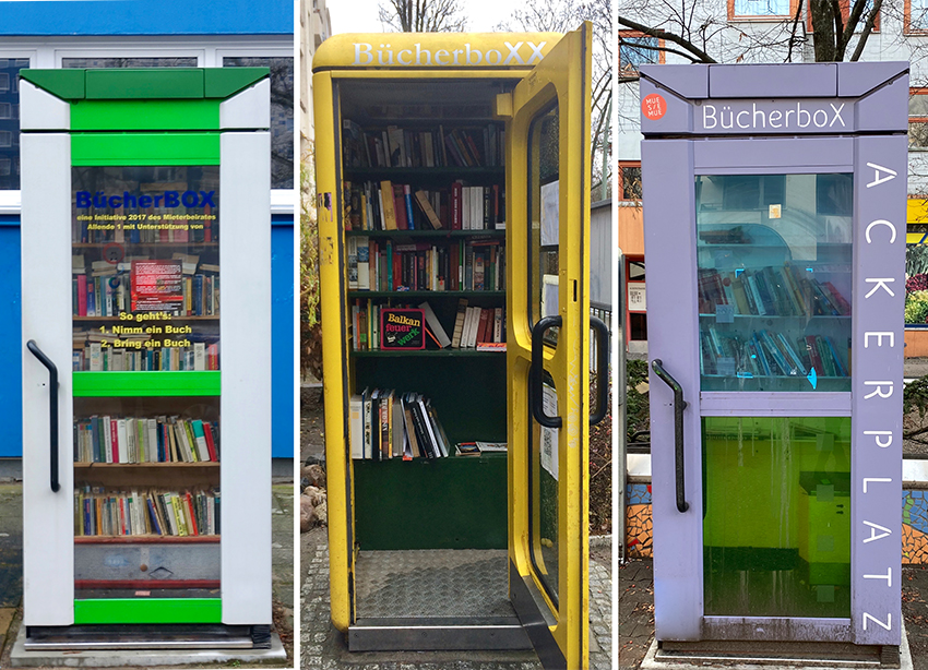 drei Bücherboxen in weiß, gelb und lila